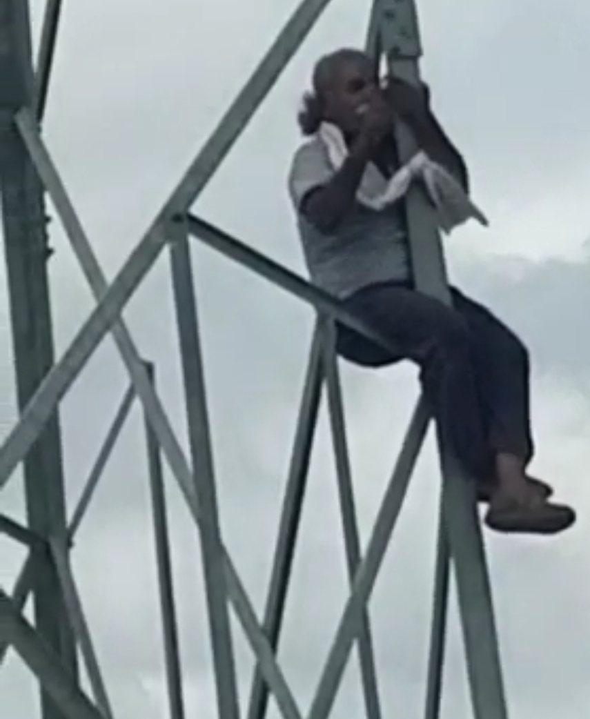 climbed-on-11kv-high-tension-tower-insisted-on-arresting-daughter-too